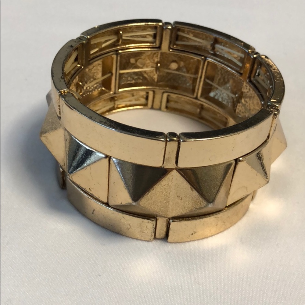Gold cuff bracelet.